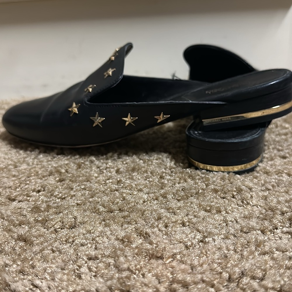 Size 8 Michael Kors leather slides. Black with gold stars.